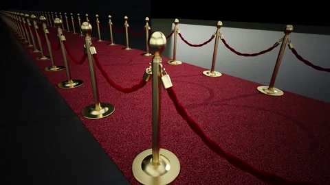 Red carpet with silver posts and velvet ropes on black background. 3D animation Stock Footage 294312401