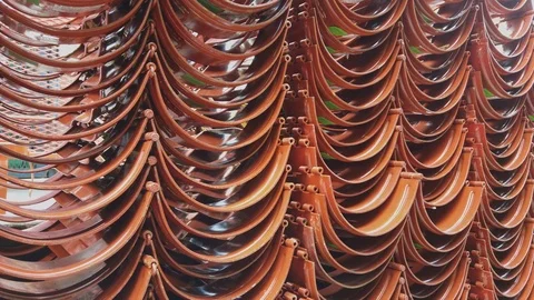 Red casing centralizers stacked on the deck of a drilling rig Stock Footage 102640897
