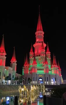 Red castle in the night Stock Photos