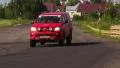Red cat looking as a fire truck or emergency on the race track HD Footage
