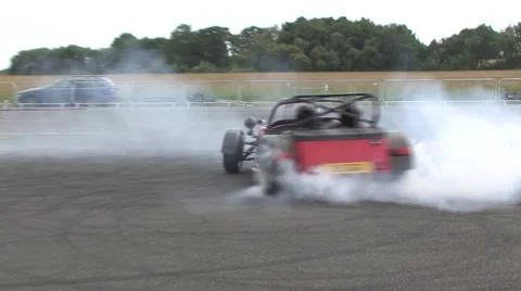 Red Caterham 7 drift Stock Footage 49752691
