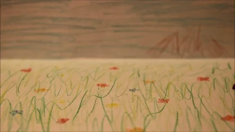 Red caterpillar crawling along a painted landscape Stock Footage 77862559