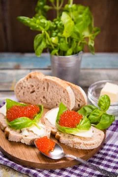 Red caviar on bread Stock Photos