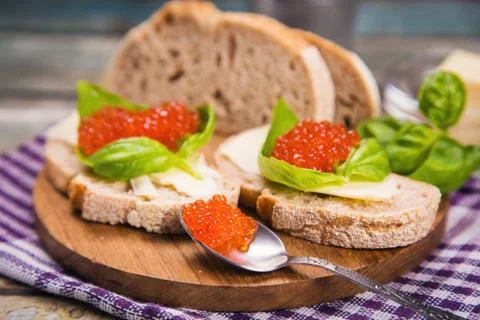 Red caviar on bread Stock Photos