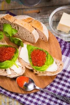 Red caviar on bread Stock Photos