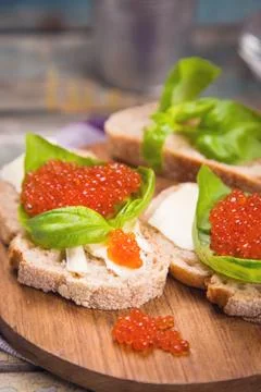 Red caviar on bread Stock Photos