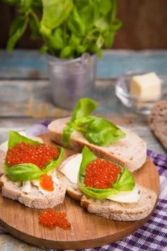 Red caviar on bread Stock Photos