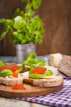 Red caviar on bread Stock Photos