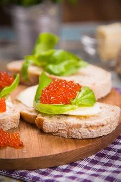 Red caviar on bread Stock Photos