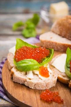 Red caviar on bread Stock Photos