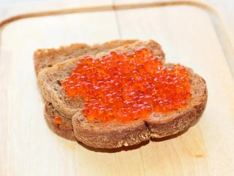 Red caviar for breakfast Stock Photos