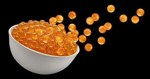 Red caviar isolated on black background Stock Photos