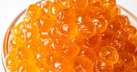 Red Caviar rotated background. Close-up salmon caviar rotation. Delicatessen Stock Footage 123055144