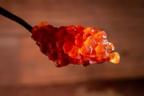 Red caviar on a small spoon2 Stock Photos