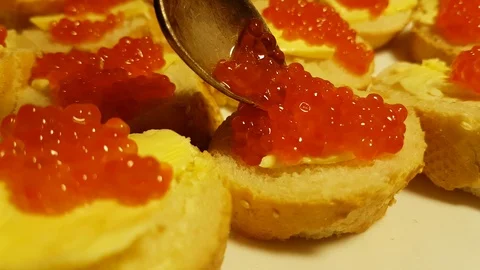 Red caviar spoon Stock Footage 89246046