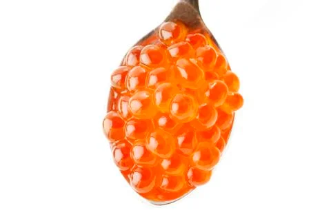Red caviar on a spoon Stock Photos