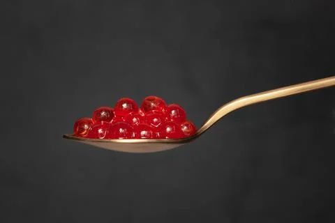 Red caviar in the spoon Stock Photos