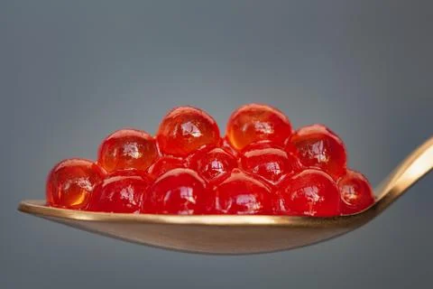 Red caviar in the spoon Stock Photos