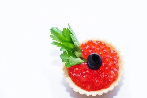 Red caviar in tartlets close up on a white background Stock Photos