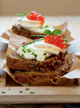 Red caviar with wholemeal bread. Stock Photos