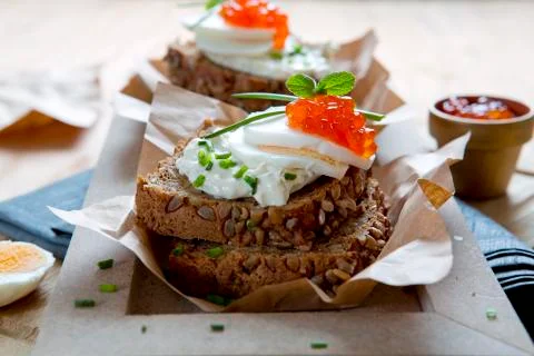 Red caviar with wholemeal bread. Stock Photos