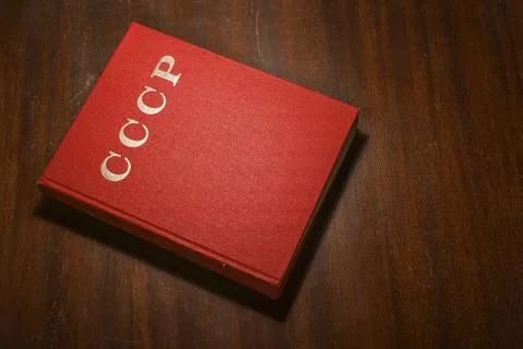 Red CCCP book on the table Stock Photos