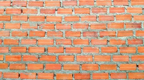 Red cement bricks as the wall for the backdrop. Stockfoto's