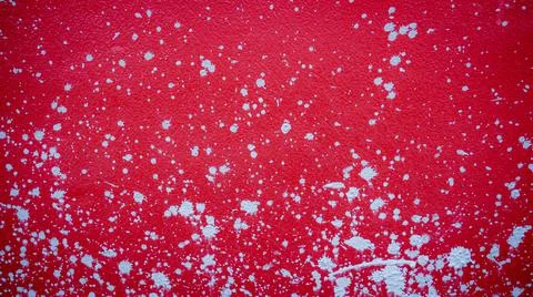 Red cement wall with splash marks, scattered mortar, used as a background or  Fotos de archivo