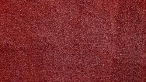 Red cement wall texture background. Rough texture. Stock Photos