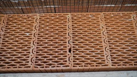 Red ceramic block for the construction of a private house.. A stack of red da 写真素材