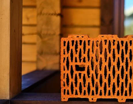 Red ceramic brick-made of special clay with roasting in the oven Stock Photos