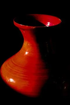 Red Ceramic Vase in Dramatic Light  Fine Art Still Life 写真素材