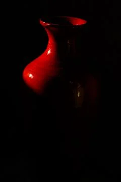 Red Ceramic Vase in Dramatic Light  Fine Art Still Life 写真素材