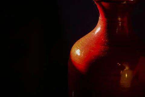 Red Ceramic Vase in Dramatic Light  Fine Art Still Life 写真素材