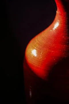 Red Ceramic Vase in Dramatic Light  Fine Art Still Life 写真素材