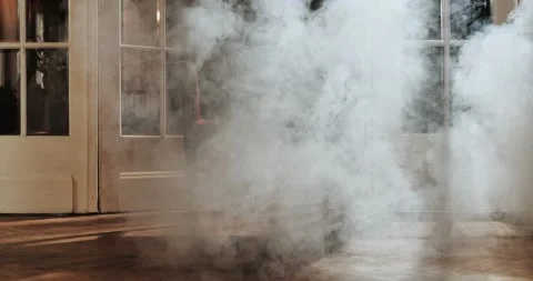 Red chair in the middle of old soviet room disappears in lot of smoke. Stock Footage 147276379