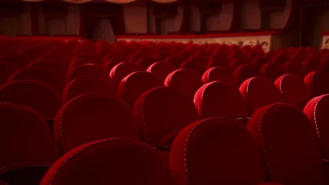 Red chairs background. Rows of comfortable chairs without people Video stock 149924139
