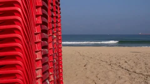 Red chairs on beautiful beach Stock-Footage 12211697