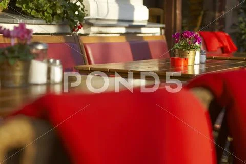 Red chairs outside a restaurant, prenzlauer berg, berlin, germany, europe Stock Photos