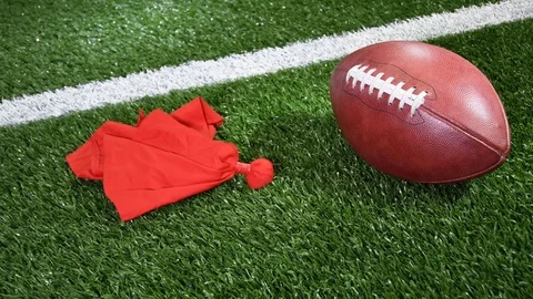 Red Challenge flag thrown next to American Football Stock Footage 116002089