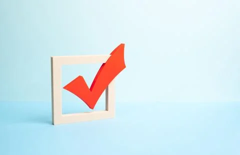 Red check mark in a square symbolizes voting and approval. Elections and poli Stock Photos