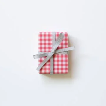 Red check pattern gift box isolated on white background. top view, copy sp... Stock Photos