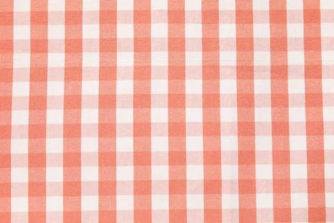 Red checkered napkin as background, closeup Stock Photos