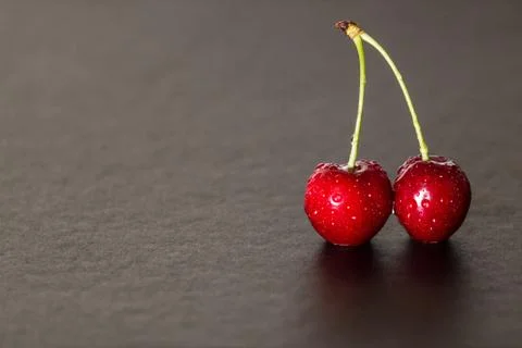 Red cherries with dripping Stock Photos