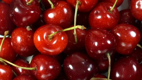 Red cherry berries rotates as a background Stock Footage 134243923