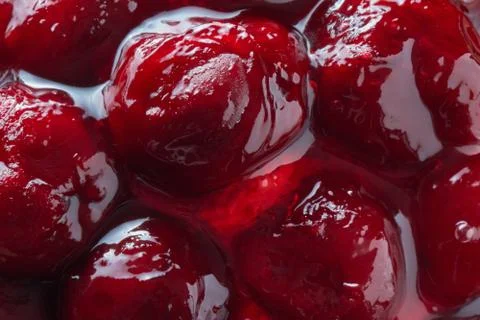Red Cherry berry Jam background. Closeup view. Stock Photos