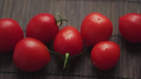 Red cherry fresh tomatoes close up slow motion. Stock Footage 133344692