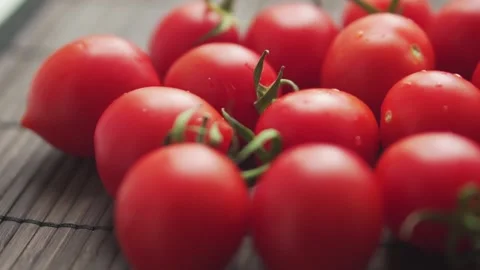 Red cherry fresh tomatoes close up slow motion. Stock Footage 133344764