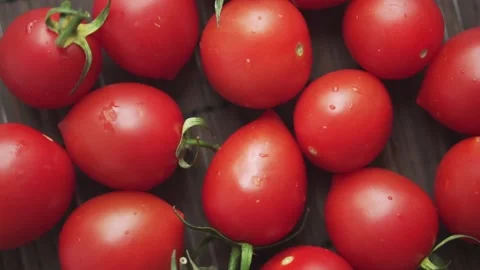 Red cherry fresh tomatoes close up slow motion. Stock Footage 133344776