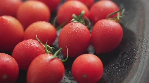 Red cherry fresh tomatoes close up slow motion. Stock Footage 133344799